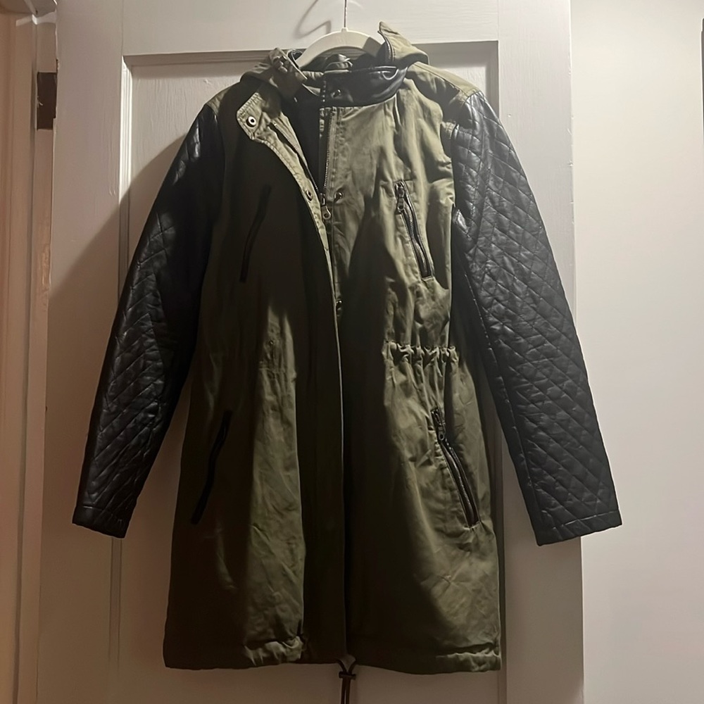 Green and black leather jacket